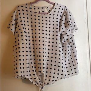 White polkadot shirt with knot at the bottom